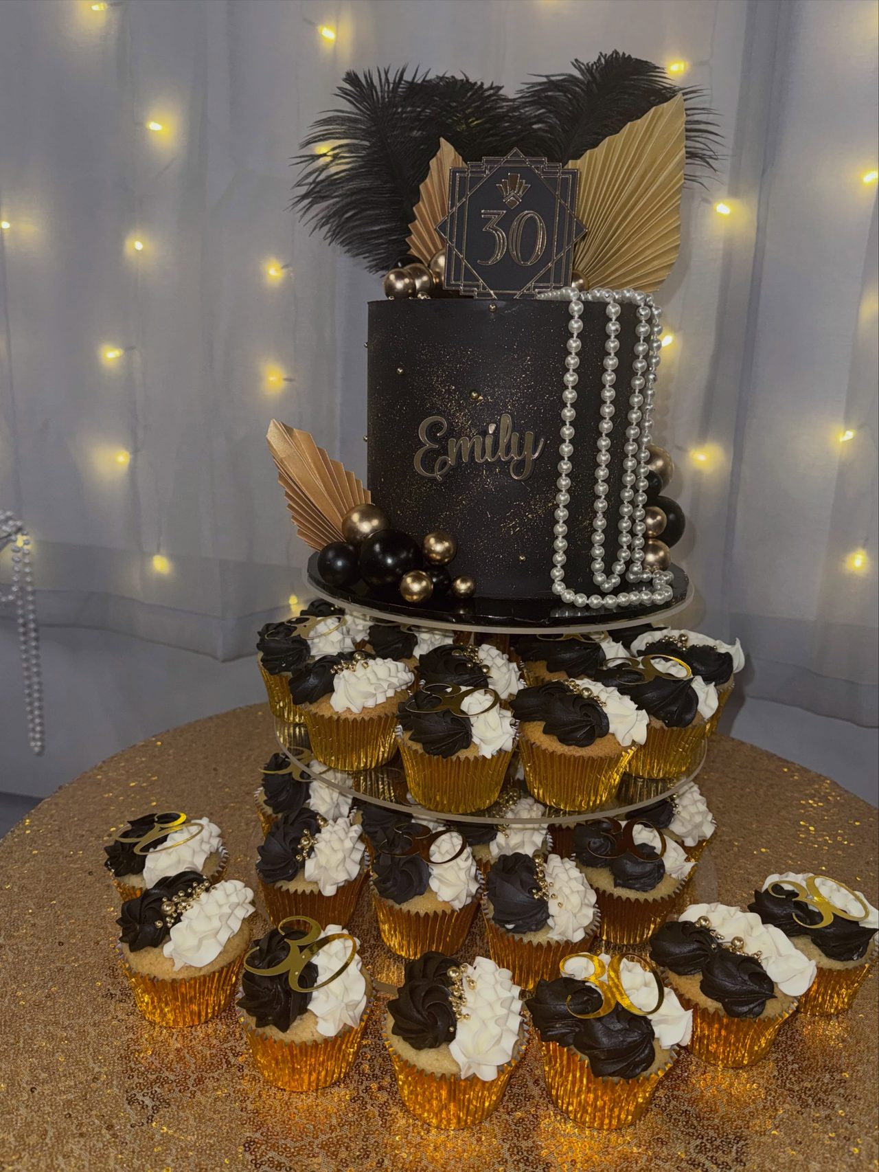 Black and gold 50th cupcake tower